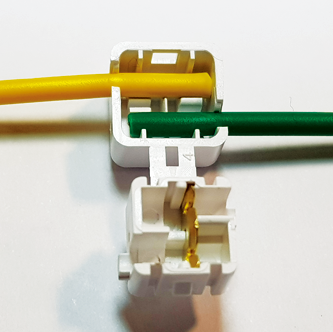 TCL-I モデル e-分岐タップの接続方法：電線固定